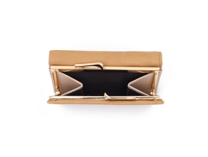 Detail view of the open brown trifold wallet with vintage gold clasp and inner pockets