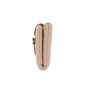 Side view of foldable beige trifold wallet featuring textured wave pattern and gold metal buckle