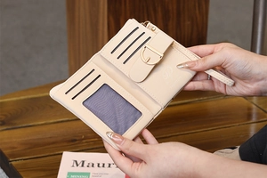 Detailed interior of a cream leather short wallet with multiple card slots and ID window