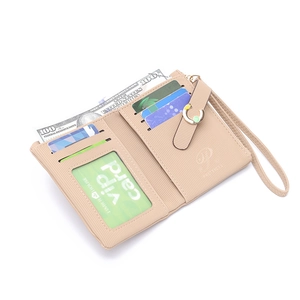 Detail view of beige PU leather wallet featuring multiple card slots and a clear ID window