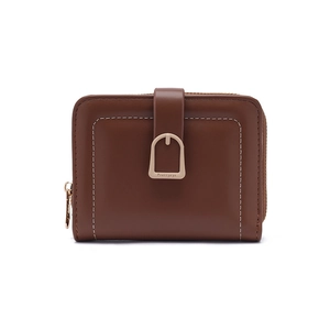 Detail of brown PU leather wallet with white stitching and gold horseshoe buckle