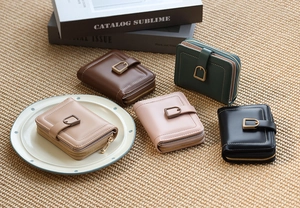 Macro detail of PU leather mini wallets in five colors with vintage buckle and zipper