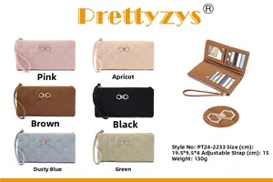Detail of multi-functional women's long wallet with card slots and metal buckle closure