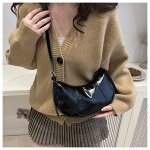 Retro black patent leather crescent shoulder bag with adjustable strap and glossy finish