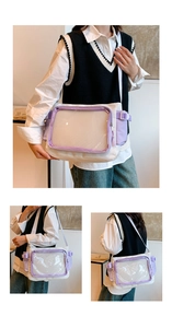 Detailed view of white canvas ita bag with clear PVC window and light purple zipper accents