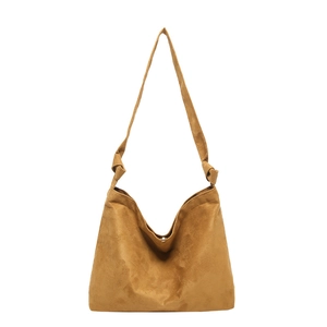 Large brown frosted suede tote bag with knotted shoulder straps and magnetic closure
