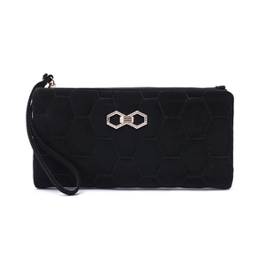 Detail of black quilted long wallet with golden bow buckle and wrist strap