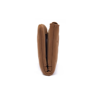 Side view of brown quilted leather wallet showing layered structure and stitching detail