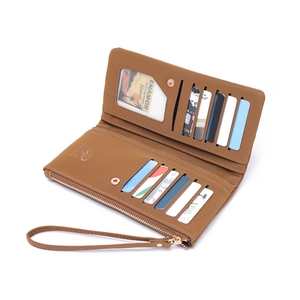 Brown long quilted wallet with multiple card slots and wristlet strap on white background