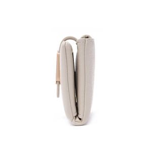 Side view of beige PU leather trifold wallet showing compact structure and gold clasp