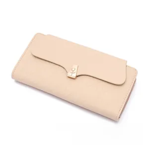 Detail of beige quilted faux leather long wallet with golden rose flower metal clasp