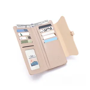 Interior detail of a long pink PU leather wallet showing multiple card slots and ID window