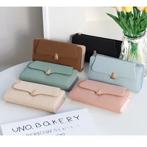 Group display of quilted PU leather wallets with tulip metal clasps in six soft colors