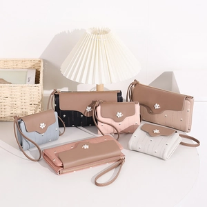 Detailed collection of long wallets and crossbody bags with floral metal buckles and textures