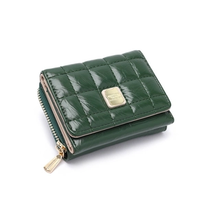 Quilted dark green tri-fold women's wallet with gold-tone hardware and secure double zipper