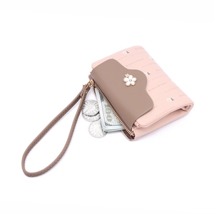 Women's pink PU leather short wallet with flower clasp, zipper coin pocket and wrist strap