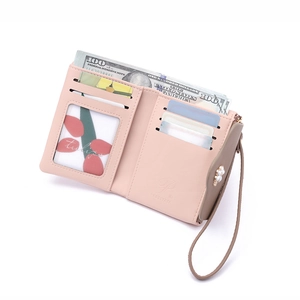 Short pink PU leather wallet with card slots, coin zipper pocket, and wrist strap