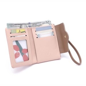 Detailed interior of pink PU leather wallet showing card slots and ID window