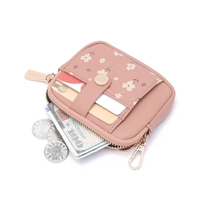 Pink floral mini bi-fold wallet with snap closure and gold zipper for coins and cards
