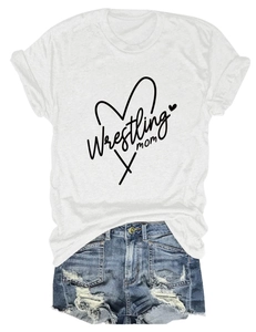 Detailed flat lay of a white Wrestling Mom T-shirt with heart graphic and denim shorts