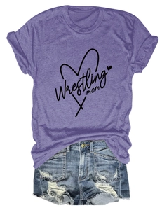 Detailed view of Wrestling Mom lettering and heart print on a purple cotton blend T-shirt
