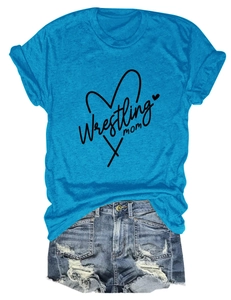 Flat lay of Wrestling Mom royal blue t-shirt and distressed denim shorts summer set