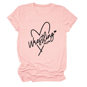 Close-up of soft pink cotton t-shirt fabric with Wrestling MOM print and heart design