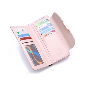 Detail of pink PU leather wallet with multiple card slots and clear ID window