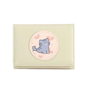 Close-up of mint green bi-fold wallet featuring a cute grey tabby cat and pink heart detail