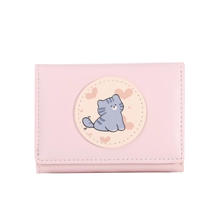 Detailed close-up of a pink PU leather wallet with a cute purple cat and heart patch
