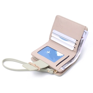 Interior detail of short folding wallet with card slots, ID window and coin pocket
