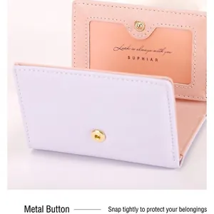 Slim tri-fold heart wallet for women in macaron pink and purple with gold snap closure
