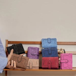 Retro matte short bi-fold wallets for women in multiple colors with snap closure