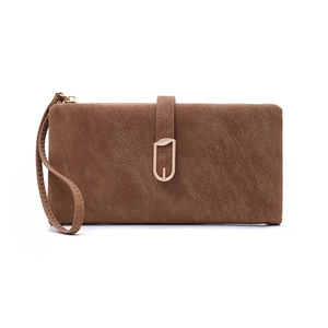 Detail of brown matte wallet with leaf buckle, zipper closure, and wrist strap