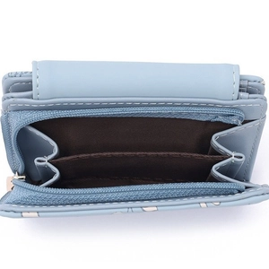 Detail of light blue PU leather wallet showing zip coin compartment and brown lining