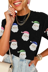 Gros plan des motifs Père Noël en paillettes étincelantes sur un T-shirt de Noël noir stylé