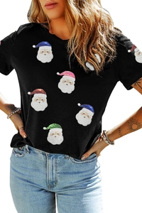 Détail d'un t-shirt noir pour femmes avec motifs de Père Noël à paillettes multicolores