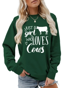 Detail of dark green cotton sweatshirt with Just a girl who loves Cows white graphic print