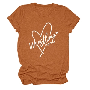 Close-up of rust orange Wrestling Mom t-shirt with heart graphic and cotton texture