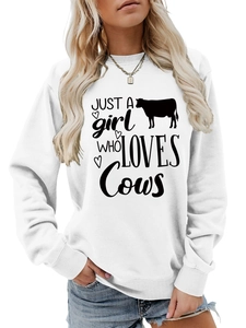 Close-up of white cotton sweatshirt with Just a girl who loves Cows text and cow graphic