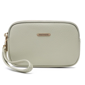 Detail of mint green lychee pattern faux leather passport wallet with gold zipper