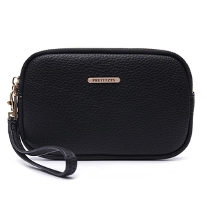 Close-up of black litchi pattern leather clutch with gold metal logo and wrist strap
