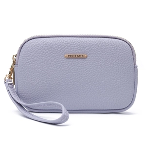 Detail of lavender litchi pattern leather wristlet bag with logo and zipper closure