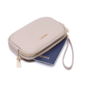 Beige minimalist PU leather handbag with multi-layer zippers and detachable wrist strap