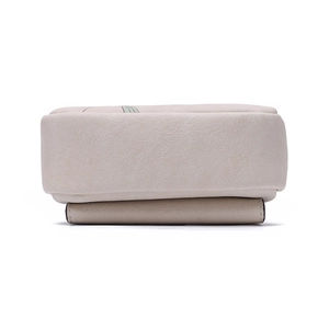 Detailed bottom view of beige PU leather wallet with lychee texture and neat stitching
