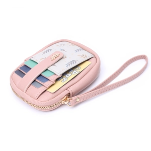 Mini portefeuille rose étanche avec fentes pour cartes et détail de poche imprimé