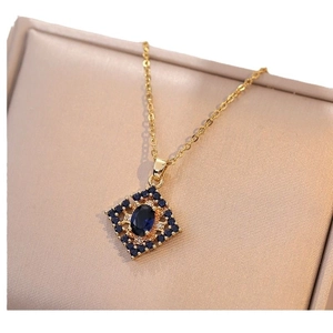 Elegant gold titanium necklace featuring a square pendant with deep blue zircon stones