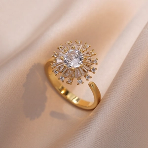 Adjustable golden sunflower ring featuring sparkling white zircon on champagne silk background