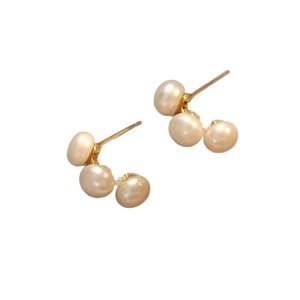 Elegant gold earrings with three natural cream pearls arranged in a stylish arc design