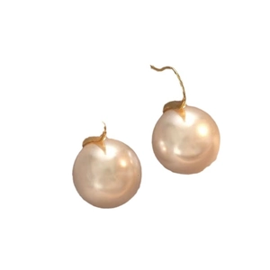 Minimalist gold hook earrings featuring elegant champagne pearls on white background